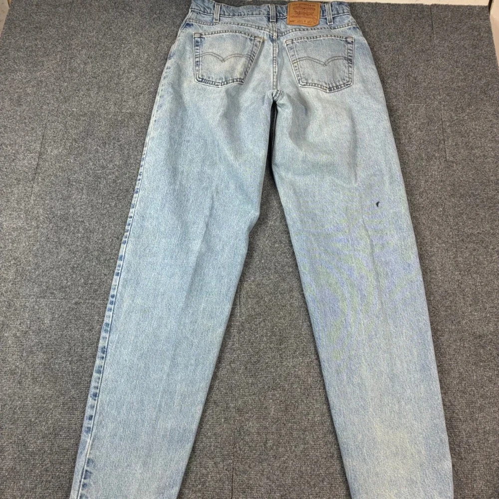 Vintage Levis 560 Loose Fit Tapered Leg Jeans Light Wash Made in USA Mens 33x36